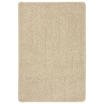 Vloerkleed shaggy anti-slip 140x200 cm crèmekleurig