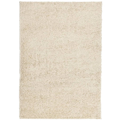 Vloerkleed shaggy hoogpolig modern 140x200 cm goudkleurig