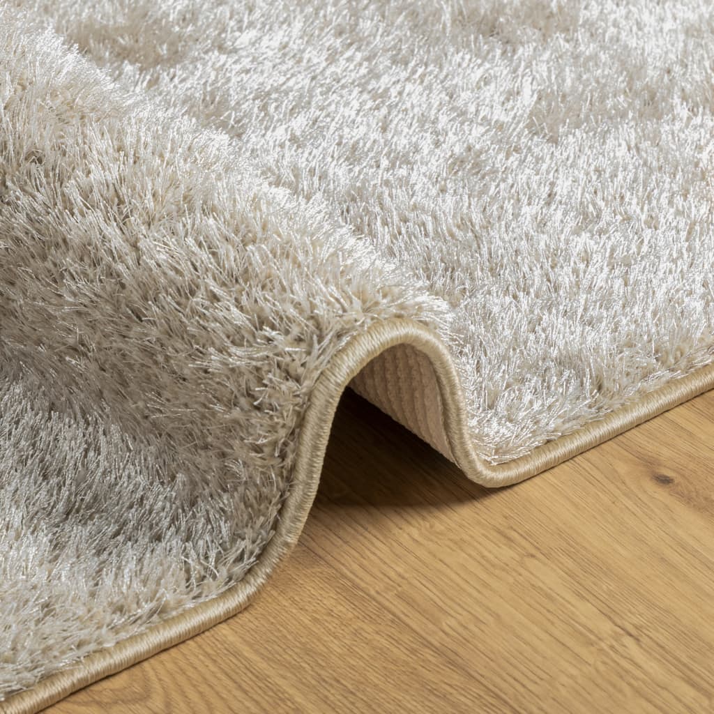 Vloerkleed ISTAN hoogpolig glanzend 100x200 cm beige