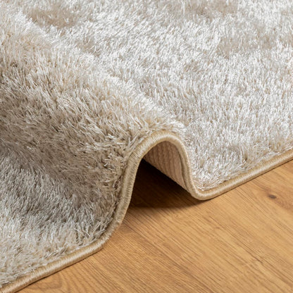 Vloerkleed ISTAN hoogpolig glanzend 100x200 cm beige