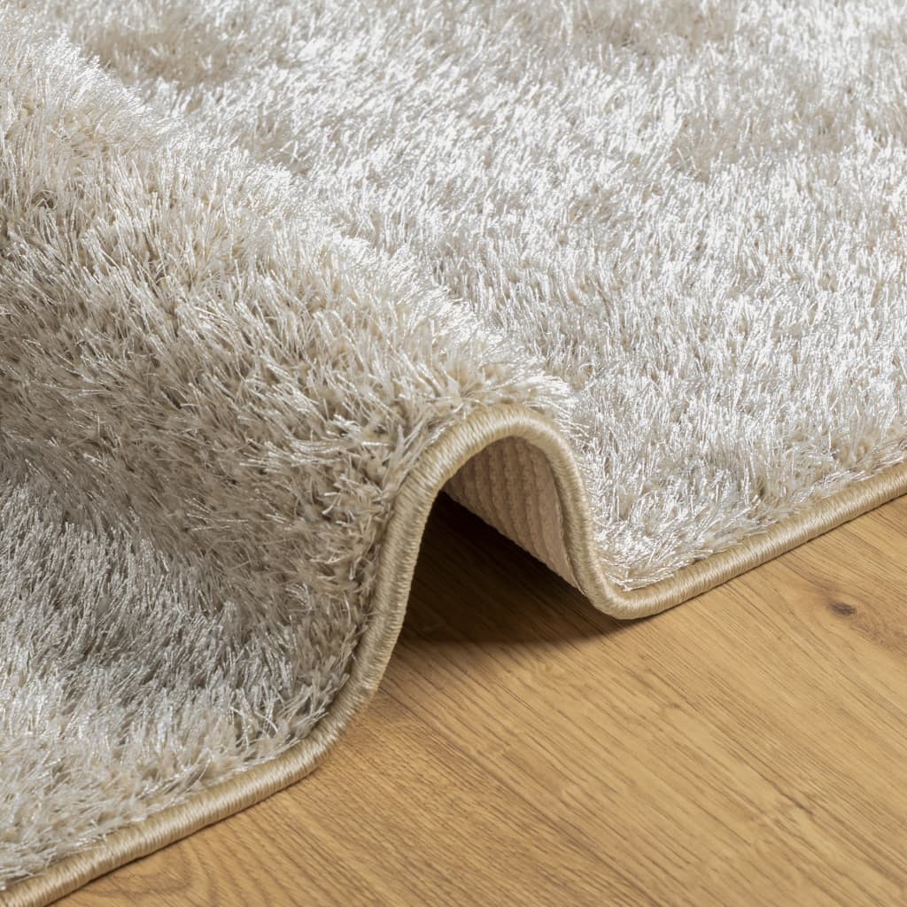 Vloerkleed ISTAN hoogpolig glanzend 140x200 cm beige